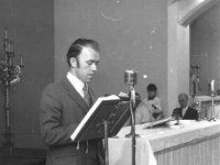 Glor na nGael Presentations in Claremorris, May 1976 - Lyons0013471.jpg  Glor na nGael Presentations in Claremorris, May 1976. Sean Fitzpatrick National School Teacher and MCC reading the lesson. : 1976 Misc, 19760530 Glor na nGael Presentations in Claremorris 7.tif, Claremorris, Lyons collection