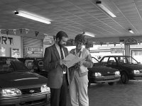 Griffith's Garage, Claremorris, September 1988. - Lyons0013511.jpg  John Brady Sales Manager, Griffith's Garage, Claremorris, talking to the secretary. September 1988. : 19880903 Griffith's Garage 3.tif, Claremorris, Lyons collection