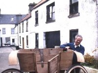 Mattie Gilligan restoring the 19th century tub trap. Claremorris, 1989. - Lyons0013522.jpg  Mattie Gilligan restoring the 19th century tub trap. Claremorris, 1989. : 19890420 A Coaching Story 5.tif, Claremorris, Farmers Journal, Lyons collection