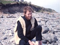 Sid Rawle " High Priest " of the hippy commune on Dorinish Island, August 1971 - Lyons0020494.jpg  Sid Rawle " High Priest " of the hippy commune on Dorinish Island, Clew Bay which was owned by Beatle John Lennon and who gave permission to Sid Rawle to try and live there with his followers. The island is a wind swept island in Clew Bay with little or no shelter. Behind Sid can be seen the ruins of a former homestead on the island. August 1971