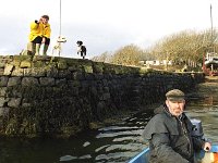 Owners of Inishturk Beag leaving the island, 1999 - Lyons00-20525.jpg  Bob and his wife Helma who owned Inishturk beag, which is just off Cleggan, Kilmeena, Westport. Bob leaving his island and his wife Helma waving good bye. : 1999 Misc, 19990127 Inisturk Beag 4.tif, Lyons collection