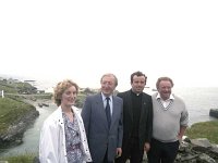 Inishturk: switching on of electricity supply. - Lyons0008934.jpg  Inishturk: The official " switch on " of the electricity supply on the island by an Taoiseach Charles J Haughey.     Left to right : Fionnuala Heaney, Charles Haughey, Fr Denis Carney ADM, Westport and Mark Killalea TD MEP. (Neg 12) Inishturk: The official " switch on " of the electricity supply on the island by an Taoiseach Charles J Haughey.   Left to right : Fionnuala Heaney, Charles Haughey, Fr Denis Carney ADM, Westport and Mark Killalea TD MEP. (Neg 12) : 19870704 Inishturk 1.tif, Inish Turk, Lyons collection