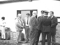 Inishturk: switching on of electricity supply. - Lyons0008953.jpg  Martin Joe O' Toole talking to Mickie O' Toole, Inisturk while Denis Gallagher Minister for the Gaeltacht talks to the Garda. (Neg 5A 6) : 19870704 Inishturk 20.tif, Inish Turk, Lyons collection