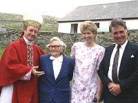 Confirmation on Inishturk. - Lyons0008956.jpg  Inishturk: Archbishop Joseph Cassidy with Mrs O' Toole, her daughter Annie Alice Coleman O' Toole and Paddy Coleman O' Toole. (Neg 24A) : 19910617 Confirmation on Inish Turk 2.tif, Inish Turk, Lyons collection