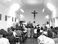 Confirmation on Inishturk. - Lyons0008964.jpg  Confirmation on Inishturk. On altar Fr Tadhg O Morain, Archbishop Cassidy and Fr Peter Gannon. (Neg 5A 6) : 19910617 Confirmation on Inish Turk 10.tif, Inish Turk, Lyons collection