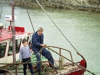 Inishturk: Mick O' Toole tying up - Lyons0008988.jpg  Inishturk: Mick O' Toole tying up. (Neg 17 17A) : 199210 Inish Turk 41.tif, 19921001 Inish Turk 41.tif, Inish Turk, Lyons collection