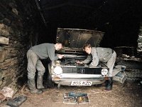 Inishturk: The O' Toole boys doing car maintenance. - Lyons0009036.jpg  Inishturk: The O' Toole boys doing car maintenance. (Neg 24) : 199210 Inish Turk 19.tif, 19921002 Inish Turk 19.tif, Inish Turk, Lyons collection