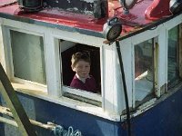 Inishturk: Yong sailor in his dad's boat.. - Lyons0009041.jpg  Inishturk: Yong sailor in his dad's boat. (Neg 26A 27) : 199210 Inish Turk 26.tif, 19921002 Inish Turk 26.tif, Inish Turk, Lyons collection