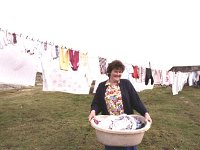 Inishturk: Mary Catherine Heanue - Lyons0009086.jpg  Inishturk: Mary Catherine Heanue hanging out the washing. (Neg 36) : 19921005 Inish Turk 3.tif, Inish Turk, Lyons collection