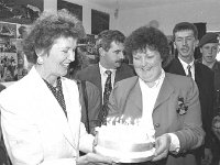 Visit of President MAry Robinson to Inishturk - Lyons0009112.jpg  Mary Catherine Heanue presenting a birthday cake to Mary Robinson on behalf of the Inishturk community. (Neg 5 5A) : 19930521 President Mary Robinson's visit 25.tif, Inish Turk, Lyons collection