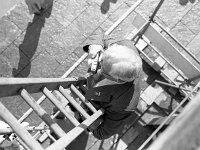 Knock Shrine, 1979. - Lyons00-21123.jpg  Pioneer pilgrimage in 1979. Member of the Pioneer Association using the photographer's ladder. : 19790527 Pilgrimage 2.tif, Knock Shrine, Lyons collection