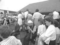 Knock Shrine, 1989. - Lyons00-21201.jpg  Pioneer Association of Total Abstinence pilgrimage to Knock. Priest hearing confession with his head covered from the sun. : 19890618 Pioneer Pilgrimage 2.tif, Knock Shrine, Lyons collection