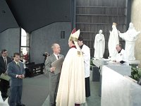 Knock Shrine, dedication of the Apparition chapel, 1992. - Lyons00-21219.jpg  Architect presenting a copy of the plans to Archbishop Cassidy at the blessing of the Apparition Chapel. Dedication of the Apparition Chapel in Knock. : 19920510 Dedication of Appararion Chapel 1.tif, Knock Shrine, Lyons collection