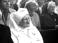 Pilgrimage in Knock, 1992. - Lyons00-21229.jpg  Pilgrims and hand-maiden. : 19920510 Pilgrimage in Knock 1.tif, Knock Shrine, Lyons collection