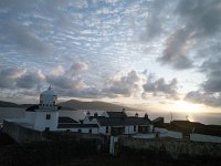 Sunrise at 5.30 AM at the Lighthouse on Clare Island, August 1994. - Lyons00-20953.jpg  Sunrise at 5.30 AM at the Lighthouse on Clare Island. Robert Timmermans from Belgium proprietor of the Lighthouse who had spent his working life in South Africa. It was subsequently bought by a lady from London who resold it. The new owner never lived there. : 19940830 Sunrise showing the Light House 2.tif, 19940830 Sunset showing the Light House 2.tif, Light Houses, Lyons collection