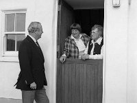 Louisburgh Holiday Cottages. - Lyons0018413.jpg  Louisburgh Holiday Cottages. Duluth College Minnesota professors talking to Joe Malone Chief Executive of Bord Failte Eireann across the half door in one of the Louisburgh Holiday Cottages. May 1980. : 19800505 Louisburgh Holiday Cottages 1.tif, Louisburgh, Lyons collection