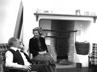 Louisburgh Holiday Cottages. - Lyons0018414.jpg  Louisburgh Holiday Cottages. Duluth College Minnesota professor Gertrude Horgan talking to Mary Bennett Chairperson of Ireland west in a traditional Louisburgh Holiday Cottage. May 1980. : 19800505 Louisburgh Holiday Cottages 2.tif, Louisburgh, Lyons collection