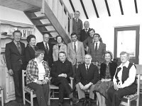 Louisburgh Holiday Cottages. - Lyons0018415.jpg  Louisburgh Holiday Cottages. Duluth College Minnesota professors sitting next to Joe Malone Chief Executive of Bord Failte Holiday Cottages centre. Second from the left Fr Kieran Waldron Chairman of Louisburgh Holiday Homes where the Duluth University students hold their Summer lectures. Second from the right Mary Bennett Chairperson Board of Ireland West. Included in the group standing are Charlie Gaffney and Clementine Lyons Board members of Louisburgh Holiday Homes; Joe Lally Regional Manager Ireland West; Mrs Oliver Morahan representative Bord Failte and Bill Mc Namara; Sean Staunton; Paddy Duffy and Joe Staunton all board members of Louisburgh Holiday Cottages.  May 1980. : 19800505 Louisburgh Holiday Cottages 3.tif, Louisburgh, Lyons collection