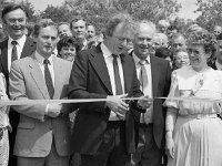 Opening of new caravan park at Old Head 1986. - Lyons0018468.jpg  Mick Lally cutting the tape. L-R : Ann Geary, Pontoon Bridge Hotel; Minister P Flynn; Enda Kenny TD and John and Kathleen Lydon propritors watching Mick at the opening of new apartments at Old Head, Louisburgh, June 1986. : 19860613 Opening of new caravan park at Old Head 9.tif, Louisburgh, Lyons collection