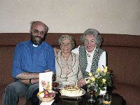 Maisie Tinsley and her mother Sybil, Louisburgh, August 1987 - Lyons0018521.jpg  Maisie Tinsley and her mother Sybil on Sybil's birthday with the Rev Jack Heaslip, Holy Trinity Church Westport. Maisie came to Ireland with her mother for the Castlebar Song Contest where her husband was composer and arranger. Maisie sang with the orchestra. They decided to put their roots in Killadoon, Louisburgh. August 1987. : 19870821 Sybil Tinsley's Birthday.tif, Louisburgh, Lyons collection