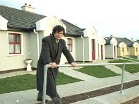 St. Brendan's sheltered housing Mulranny. - Lyons0018676.jpg  Dr J Cowley infront of his village development. St. Brendan's sheltered housing Mulranny, Co. Mayo, March 1996. : 19960319 Mulranny Sheltered Housing 3.tif, Farmers Journal, Lyons collection, Mulranny