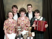 Kildownet half-set dancers from Achill with their prize winning cups, June 1992.. - Lyons0016508.jpg  Kildownet half-set dancers from Achill with their prize winning cups. Left to right : Margaret Joyce, Westport; Dermot Cooney, Achill; Mary Hughes, Derrada; Eamon ; Maeve Geraghty, Newport. June 1992. : 19920619 Derrada Dancers.tif, Lyons collection, Newport