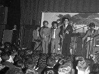 Belclare House, 1969. - Lyons00-21374.jpg  Roy Orbison in the Starlight Ballroom. Roy Orbison performing and a fine selection of healthy hair in the foreground. : 19690406 Roy Orbison in the Starlight Ballroom 2.tif, Belclare House, Lyons collection, Personalities