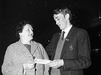 Belclare House, 1970. - Lyons00-21383.jpg  Bingo at the Starlight Ballroom for Westport soccer club. Mrs Sal McCaffery, St. Patrick's Tce, Westport receiving her bingo prize from Frank Dolan, Westport soccer club. : 19700309 Bingo in the Starlight Room 2.tif, Belclare House, Lyons collection, Westport