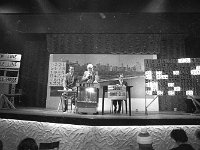 Belclare House, 1970. - Lyons00-21388.jpg  Second from left John Healy proprietor of the Starlight Ballroom and Belclare House drawing the numbers for social bingo. : 19700412 Bingo in the Starlight Ballroom 2.tif, Belclare House, Lyons collection, Westport