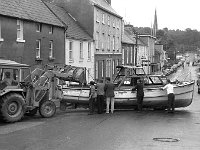 Belclare House, 1971. - Lyons00-21400.jpg  John Healy's boat which came off its trailor on James Street. The boat had gone on fire in Westport harbour and was called after his son. : 19710624 John Healy's boat 4.tif, Belclare House, Lyons collection, Westport