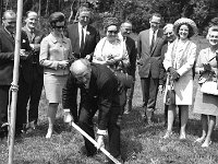 Turning the sod for Hotel Westport, June 1969. - Lyons0019735.jpg  Turning the sod for Hotel Westport, June 1969. An Taoiseach Jack Lynch turning the first sod for Hotel Westport. L-R : Padraig Hughes Director; Brendan O' Malley Director; Denis Gallagher Minister for the Gaeltacht TD; Jimmy Hughes Director; Hugh O' Malley; P J Kelly building contractor; Maire Hughes; Maureen Lynch and Taoiseach Jack Lynch. : 19690609 Turning the sod for Hotel Westport 2.tif, Lyons collection, Westport Developing