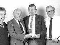 Presentation to Westport Chamber of Commerce, May 1984.. - Lyons0019759 1.jpg  Guinness area representative group sales Bill Gannon second from the left presenting a sponsorship cheque to Cormac Hughes Westport Chamber of Commerce. At left Michael Heneghan Westport CC and at right Ger Golden Westport CC. May 1984. : 19700626 Hotel Westport 6.tif, 19840501 Presentation to Westport Chamber of Commerce.tif, Lyons collection, Westport Developing