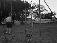 Children on the swings in the Westport House Caravan Park, June 1969.. - Lyons0018885.jpg  Children on the swings in the Westport House Caravan Park, June 1969. : 196906 Children on the swings in the Westport House Caravan Park 1.tif, Lyons collection, Westport House