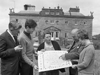 Westport House:   Showing new map of Mayo for tourism purposes, May 1968. - Lyons0019133.jpg  Westport House:   Showing new map of Mayo for tourism purposes, May 1968.  L-R : Michael Hevernin Ireland West Tourist Office, Westport; Lord Jeremy Altamont; Mr and Mrs O' Reilly from Doon, Islandeady designers of the map and visitor to Westport House. : 19680529 Showing new map of Mayo for tourism purposes.tif, Lyons collection, Westport House