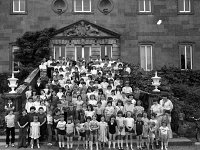 School children from Knock with Mnsgr Horan at Westport House, June 1968.. - Lyons0019134.jpg  School children from Knock with Mnsgr Horan at Westport House, June 1968. Centre of back row Mnsgr James Horan, Knock, with Lord Altamont. : 19680620 School children from Knock with Mnsgr Horan at Westport House.tif, Lyons collection, Westport House