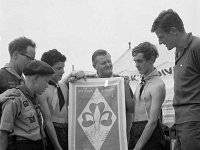 International Boy Scouts in Westport House, July 1968. - Lyons0019138.jpg  Robert Kilkelly Junior Chamber of Commerce at right admiring the Scout International emblem. International Boy Scouts in Westport House, July 1968. : 19680730 International Boy Scouts in Westport House 1.tif, Lyons collection, Westport House