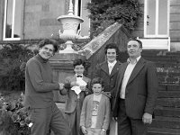 Lord Jeremey Altamont presenting the prize to the winner and his family, Westport house, August 1978. - Lyons0019538.jpg  Lord Jeremey Altamont presenting the prize to the winner and his family, Westport house, August 1978. : 19780806 Essay Competition Winners in Westport House 2.tif, Lyons collection, Westport House