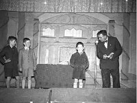 Compere Frank Flanagan with three young boys.. - Lyons0013567.jpg  Faces and Places in Westport, 1950s. Scenes from a concert in the Pavillion Ballroom with all local talent. Compere Frank Flanagan with three young boys. : 1950's Faces and Places in Westport 27.tif, 1950s Misc, Lyons collection, Westport