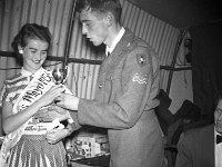 Ms Mayo Competition, Westport, 1956.. - Lyons0013687.jpg  MaureenMcKenna, Westport. being presented with her trophy by Michael Halpin. 1956. : 1956 Misc, 1956 Ms Mayo Competition 3.tif, 1956 Presentation to Maureen Mc Kenna.tif, Lyons collection, Westport