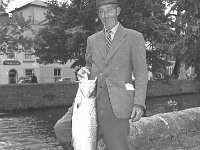 Sidney Costello from Knappagh, Westport, 1956.. - Lyons0013704.jpg  Sidney Costello from Knappagh, Westport, photographed at the Mall with his proud catch, 1956 : 1956 John Willie Hewetson.tif, 1956 Sidney Costello.tif, Lyons collection, Westport