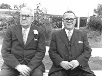 Dr Mc Greal & a friend., Westport, 1960 - Lyons0013796.jpg  At right Dr Michael Mc Greal, Westport with a friend photographed at a wedding, 1960. Dr Mc Greal was a doctor in Westport who was available to his patients twentyfour hours. : 1960 Dr Mc Greal & a friend.tif, 1960 Misc, Lyons collection, Westport
