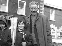 Fishing Competitions , Westport, 1976.. - Lyons0013989.jpg  Young Dermot Berry (Joe's son) prize winner with veteran angler Sydney Costello, Knappagh, Westport, March 1976. : 197603 Fishing Competitions 1.tif, Lyons collection, Westport
