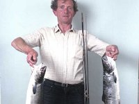 Westport angler Joe Gibbons proud of his salmon catch, August 1986. - Lyons0014205.jpg  Westport angler Joe Gibbons proud of his salmon catch, August 1986. : 198608 Westport Angler 1.tif, Lyons collection, Westport