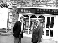 Brendan & Peter Touhy 1988.. - Lyons0014246.jpg  Brendan Touhy distinguished auctioneer and his son Peter on their premises on the North Mall, Westport, September 1988. : 198809 Brendan & Peter Touhy.tif, Lyons collection, Westport