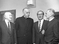 Opening of Westport Tourist Office, June 1967 - Lyons0014504.jpg  Opening of Westport Tourist Office, June 1967.  At the reception left to right : Bertie Staunton, James St. Westport President Westport Chamber of Commerce; Cannon Fr Thomas Cummins, ADM Westport; Joe Lally Western Regional Manager and the Rev Blennerhasset Rector of the Holy Trinity Church. : 19670612 Opening of Westport Tourist Office 4.tif, Lyons collection, Westport