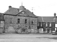The Wyatt theatre, the Octagon  Westport, 1971 - Lyons0014702.jpg  The Wyatt theatre, the Octagon showing the Weigh bridge which since has been removed regretably and to the right Kelly's private house and shop. November 1971. : 19711123 Westport 3.tif, Farmers Journal, Lyons collection, Westport, Westport.