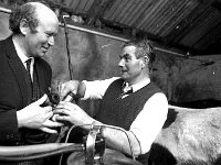 Agricultural instructor John O' Brien, Westport, 1973. - Lyons0014761.jpg  Agricultural instructor John O' Brien, Westport in discussion with Mike Duggan, January 1973. : 1973 Misc, 19730112 Pilot Area in Clogher Westport 2.tif, For the Western People Farm Supplement, Lyons collection, Westport