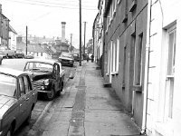 Condition of the footpath James St.  Westport, February 1973. . - Lyons0014766.jpg  Condition of the footpath James St.  Westport, February 1973. : 1973 Misc, 19730203 Footpath James St Westport.tif, Lyons collection, Westport
