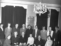 Westport Town Hall Committee, March 1973. - Lyons0014785.jpg  Westport Town Hall Committee, March 1973. Front row left to right : Sinead Ni Mhaolain; Kathleen Corcoran; Paddy Boyle; Marie Flanagan; Jim Dyar and Mrs Mickey Berry.  Back row left to right : Don Mc Greevy; Pat Bree; Paddy Dunning; Birdie Coffey; Fr Tony King; Martin Curry; Anthony Hoban; Chris Lavelle and John Judge. : 19730330 Town Hall Committee.tif, Lyons collection, Westport