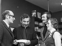 Cheque presentation to Fr King by Joe Lally Ireland West.l 1973. - Lyons0014811.jpg  Fr Anthony King receiving a cheque from Joe Lally, Regional Manager Ireland West fot the Town Hall renovation. At right Pat Bree and Mary Mc Greal, Town Hall committee. Westport, April 1973. : 1973 Misc, 19730509 Cheque presentation to Fr King by Joe Lally Ireland West.tif, Lyons collection, Westport